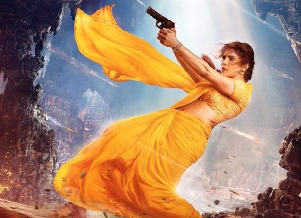 Priyanka Chopra as Mandakini from Globetrotter wields a gun in saree; first look out! : Bollywood News